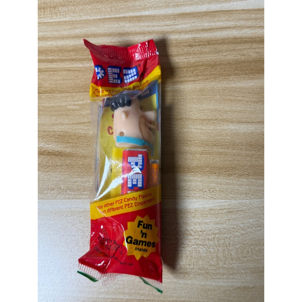 PEZ Candy Dispenser Fun 'n‎ Games Inside New in Package Fred Flinstone